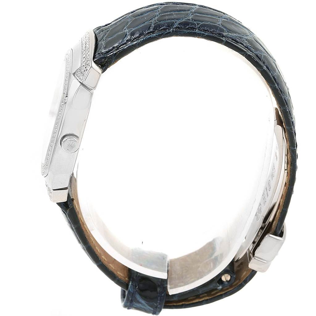 The image shows a side profile of a Rolex Cellini 6693 Women's White Gold White Dial 6693 Women's White Gold White Dial watch, highlighting the case, crown, and leather strap.