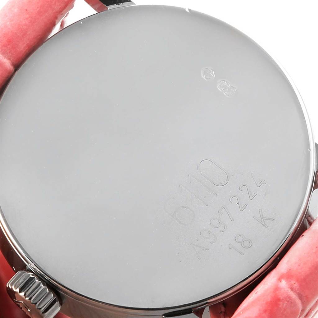 The image shows the back case of a Rolex Cellini 6110 Women
s White Gold Silver Dial 6110 Women
s White Gold Silver Dial watch, featuring a 6110 model number and 18K gold marking.