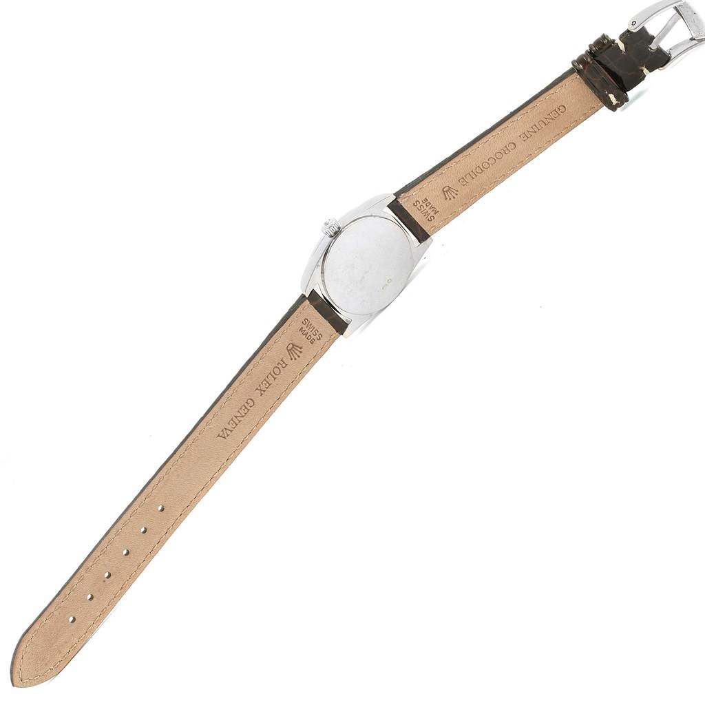 The image shows the back view of a Rolex Cellini 6229 Women's White Gold White Dial 6229 Women's White Gold White Dial watch, displaying its leather strap and clasp.