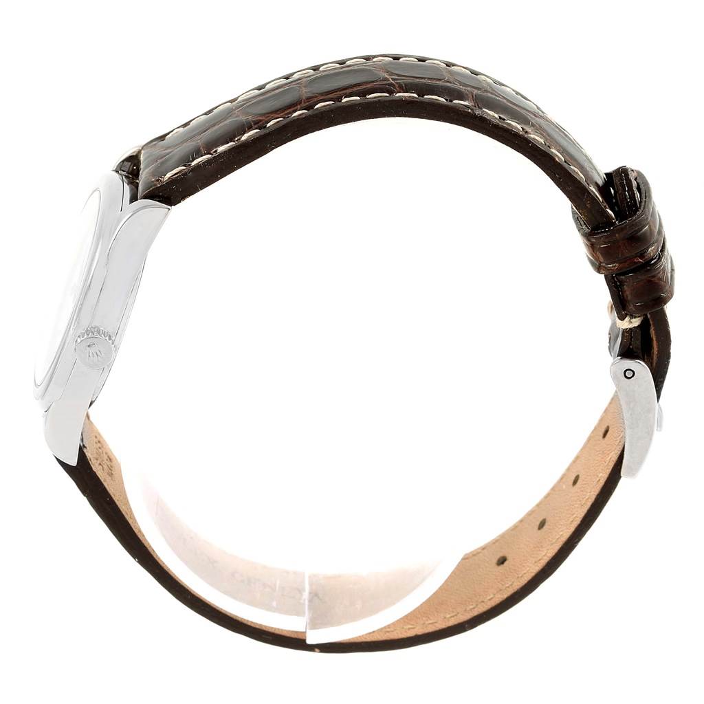 The image shows a side view of a Rolex Cellini 6229 Women's White Gold White Dial 6229 Women's White Gold White Dial watch, highlighting its brown leather strap and silver case.