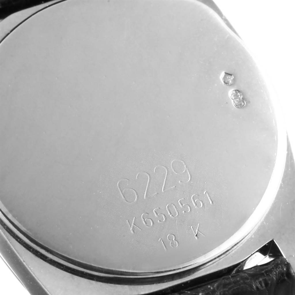 This image shows the case back of the Rolex Cellini 6229 Women
s White Gold Black Dial 6229 Women
s White Gold Black Dial model, displaying the engraved model number and serial number.