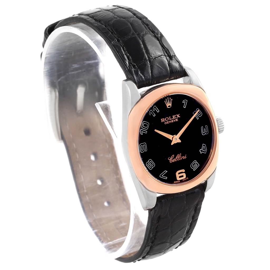 The image shows a Rolex Cellini 6229 Women
s White Gold Black Dial 6229 Women
s White Gold Black Dial watch at a 3/4 angle, displaying its black leather strap, round dial, and rose gold bezel.
