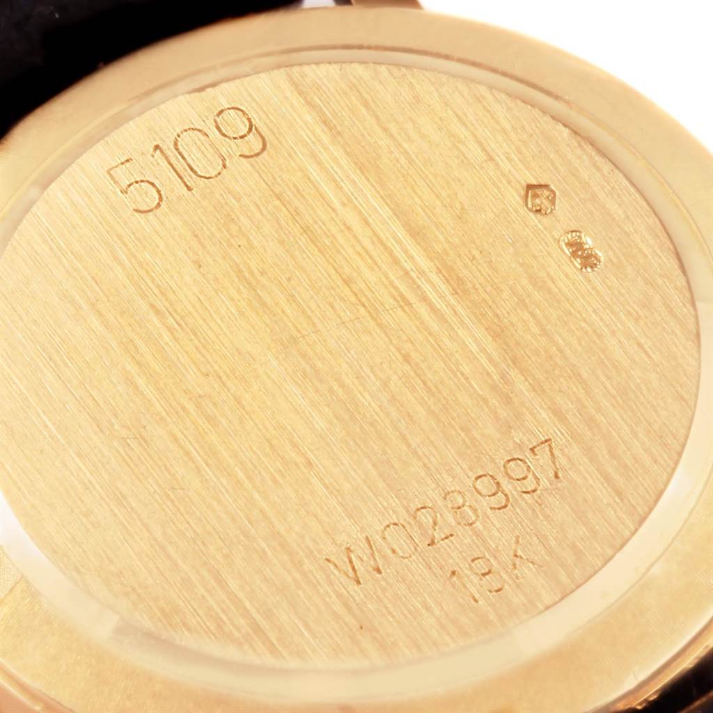 This image shows the back case of a Rolex Cellini 5109 Women's Yellow Gold Mother of Pearl Dial 5109 Women's Yellow Gold Mother of Pearl Dial watch, featuring its model number, serial number, and 18K gold mark.