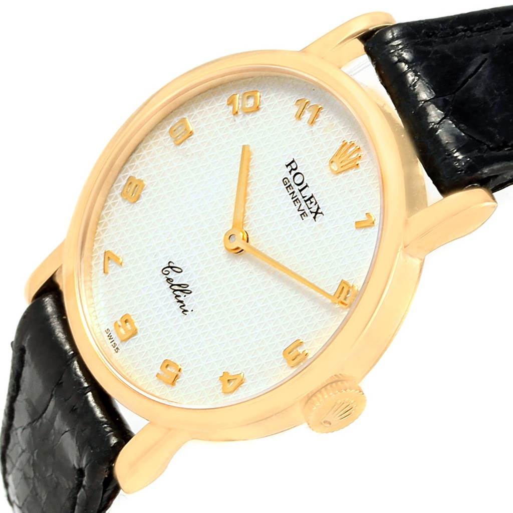 This image shows a Rolex Cellini 5109 Women's Yellow Gold Mother of Pearl Dial 5109 Women's Yellow Gold Mother of Pearl Dial watch at a slight angle, displaying its gold case, crown, white dial, and black leather strap.