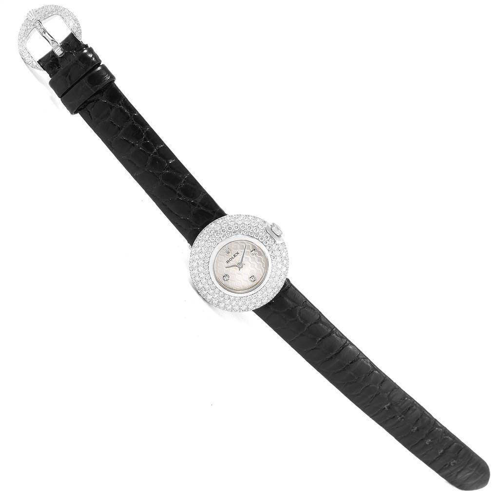 The Rolex Cellini 6201 Women's White Gold Mother of Pearl Dial 6201 Women's White Gold Mother of Pearl Dial watch is shown from a top-down angle, highlighting its full case, dial, strap, and buckle.