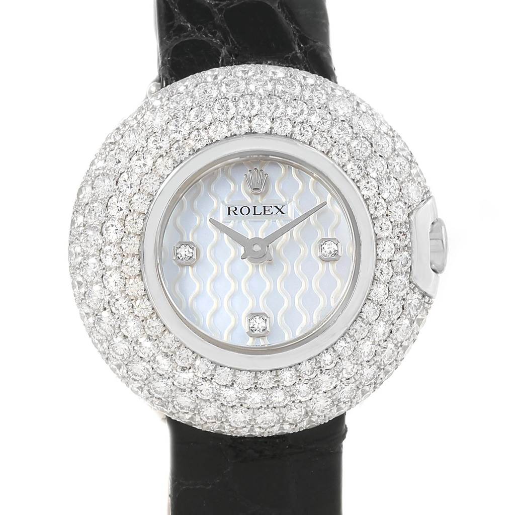 The image shows a front view of the Rolex Cellini 6201 Women's White Gold Mother of Pearl Dial 6201 Women's White Gold Mother of Pearl Dial watch, featuring a diamond-studded bezel and a black leather strap.