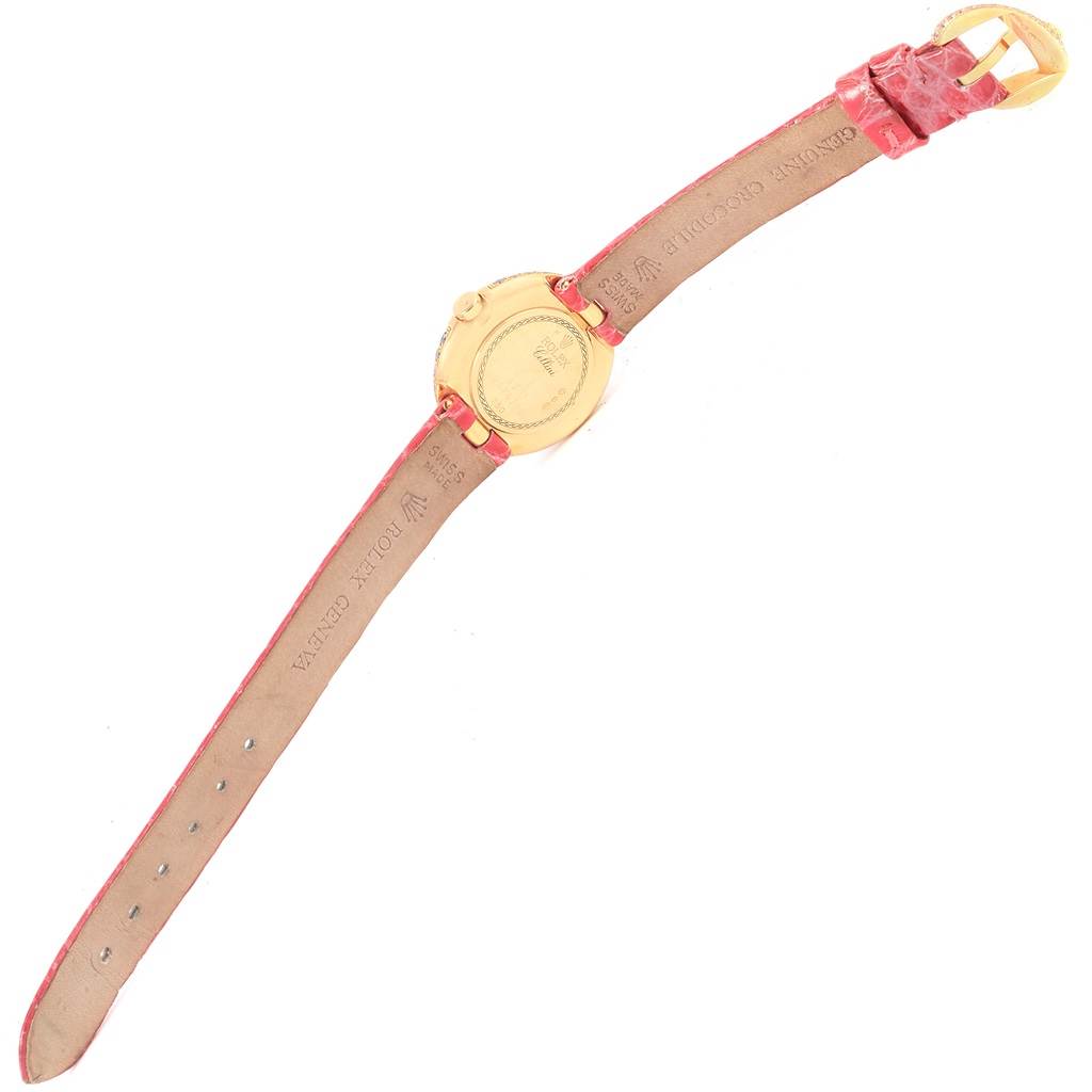 The image shows the back of a Rolex Cellini 6201 Women's Yellow Gold Mother of Pearl Dial 6201 Women's Yellow Gold Mother of Pearl Dial watch with its red leather strap fully extended and the clasp open.