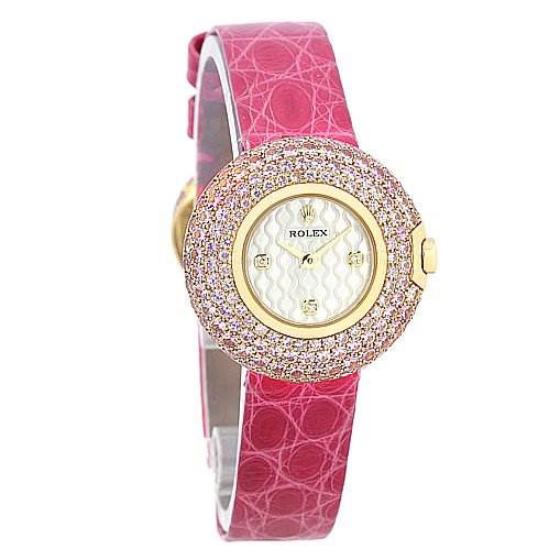 This Rolex Cellini 6201 Women's Yellow Gold Mother of Pearl Dial 6201 Women's Yellow Gold Mother of Pearl Dial watch is shown at a slight angle featuring its pink strap and bejeweled bezel.