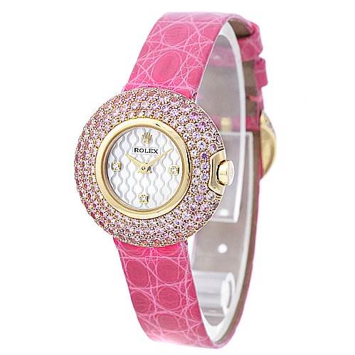 This image shows a Rolex Cellini 6201 Women's Yellow Gold Mother of Pearl Dial 6201 Women's Yellow Gold Mother of Pearl Dial watch featuring a pink strap, gold case, and diamond-studded bezel with a white, textured dial.