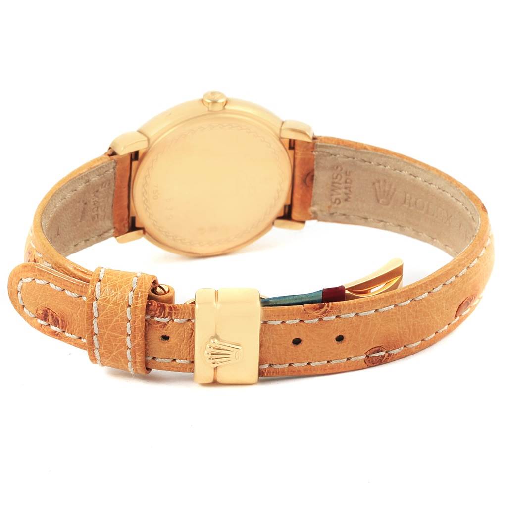 This image shows the back view of a Rolex Cellini 6621 Women's Yellow Gold Champagne Dial 6621 Women's Yellow Gold Champagne Dial watch featuring a beige leather strap and gold buckle.