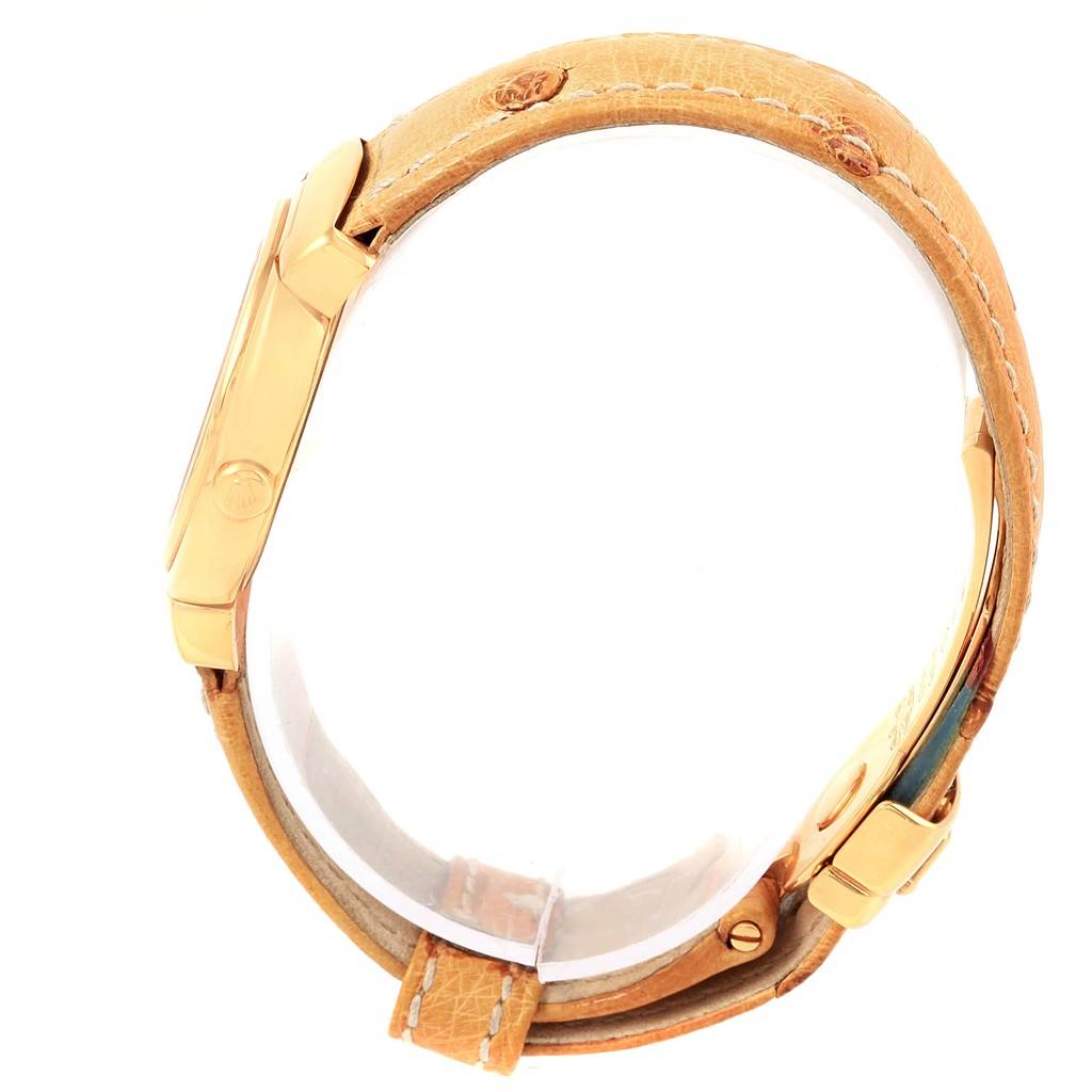 The Rolex Cellini 6621 Women's Yellow Gold Champagne Dial 6621 Women's Yellow Gold Champagne Dial watch is shown from a side angle, displaying the crown, case, and leather strap.