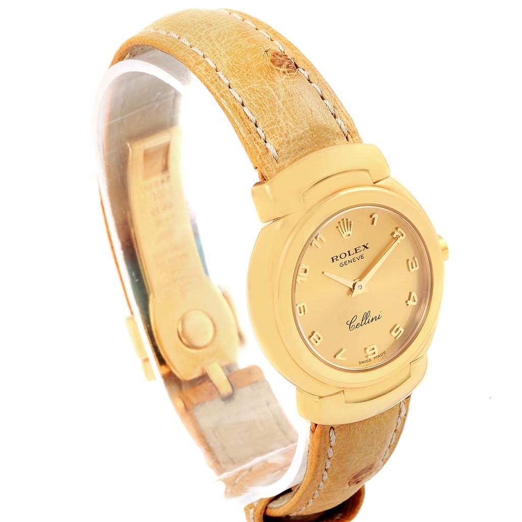 The image shows a Rolex Cellini 6621 Women's Yellow Gold Champagne Dial 6621 Women's Yellow Gold Champagne Dial watch at a side angle, displaying the dial, bezel, and part of the leather strap.