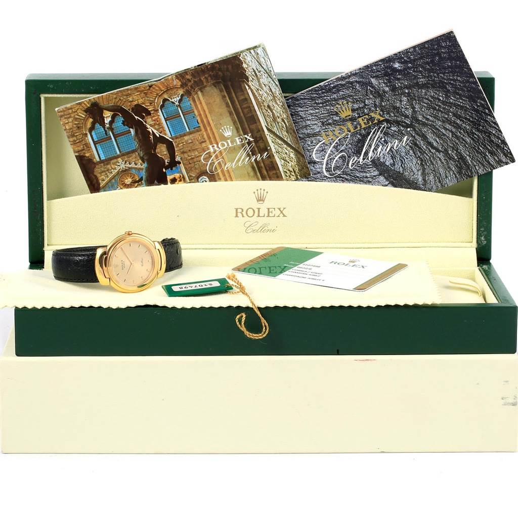 The image shows a Rolex Cellini 6622 Women's Yellow Gold Champagne Dial 6622 Women's Yellow Gold Champagne Dial watch with packaging, authenticity cards, and booklets, viewed from an eye-level angle.