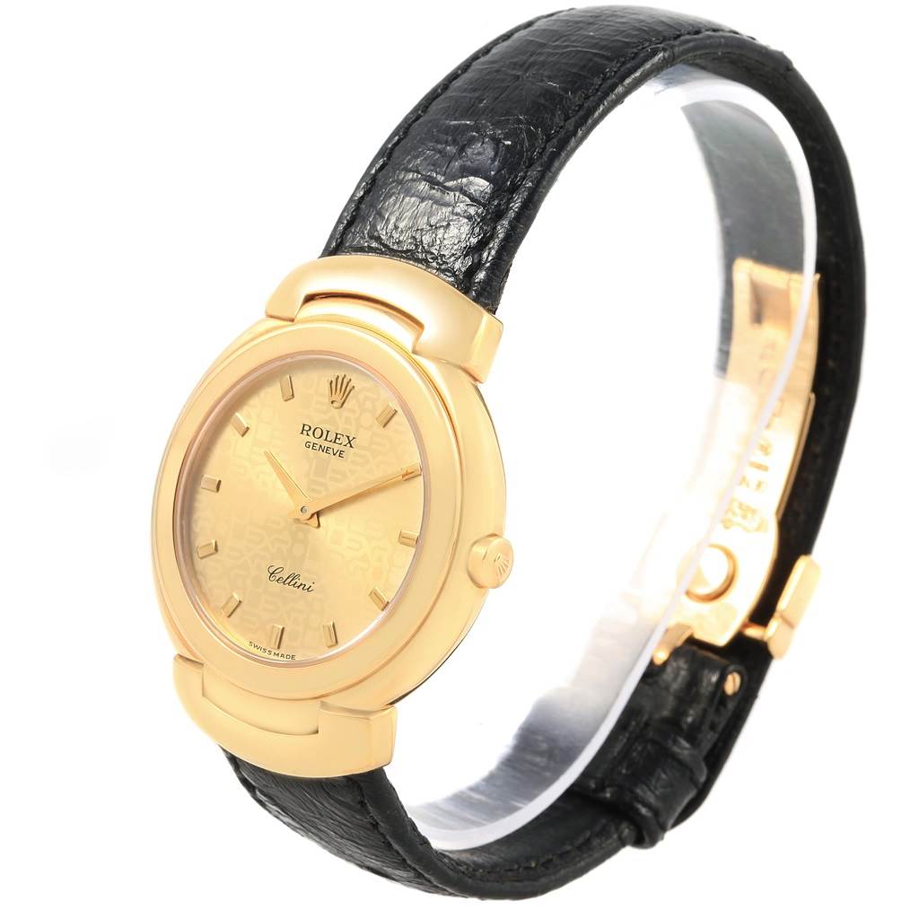 The Rolex Cellini 6622 Women's Yellow Gold Champagne Dial 6622 Women's Yellow Gold Champagne Dial watch is shown at an oblique angle highlighting its gold dial, leather strap, and crown.