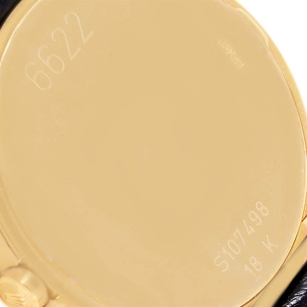 The image shows the back of the Rolex Cellini 6622 Women's Yellow Gold Champagne Dial 6622 Women's Yellow Gold Champagne Dial model watch, with visible engraving and part of the crown on the side.