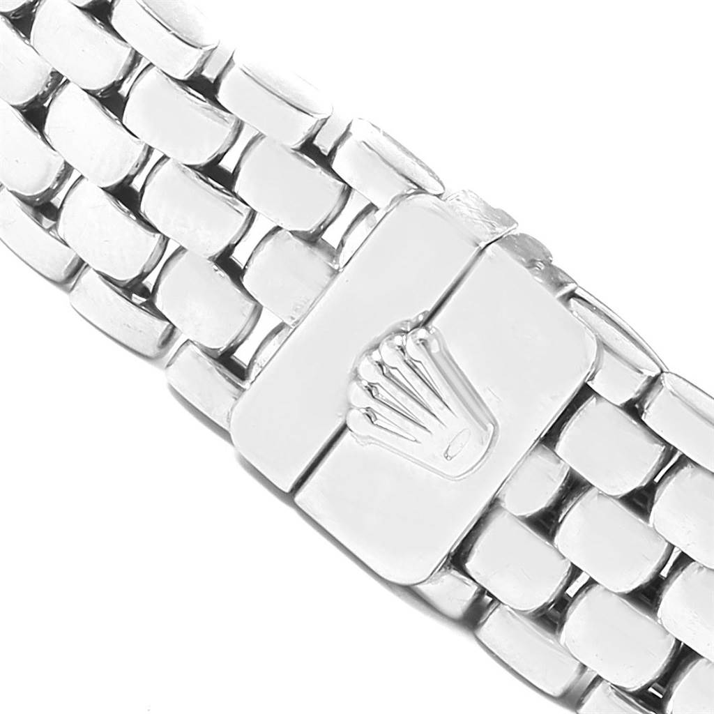 This image shows a close-up of the metal bracelet and clasp with the logo of a Rolex Cellini 6671 Women's White Gold Silver Dial 6671 Women's White Gold Silver Dial watch.