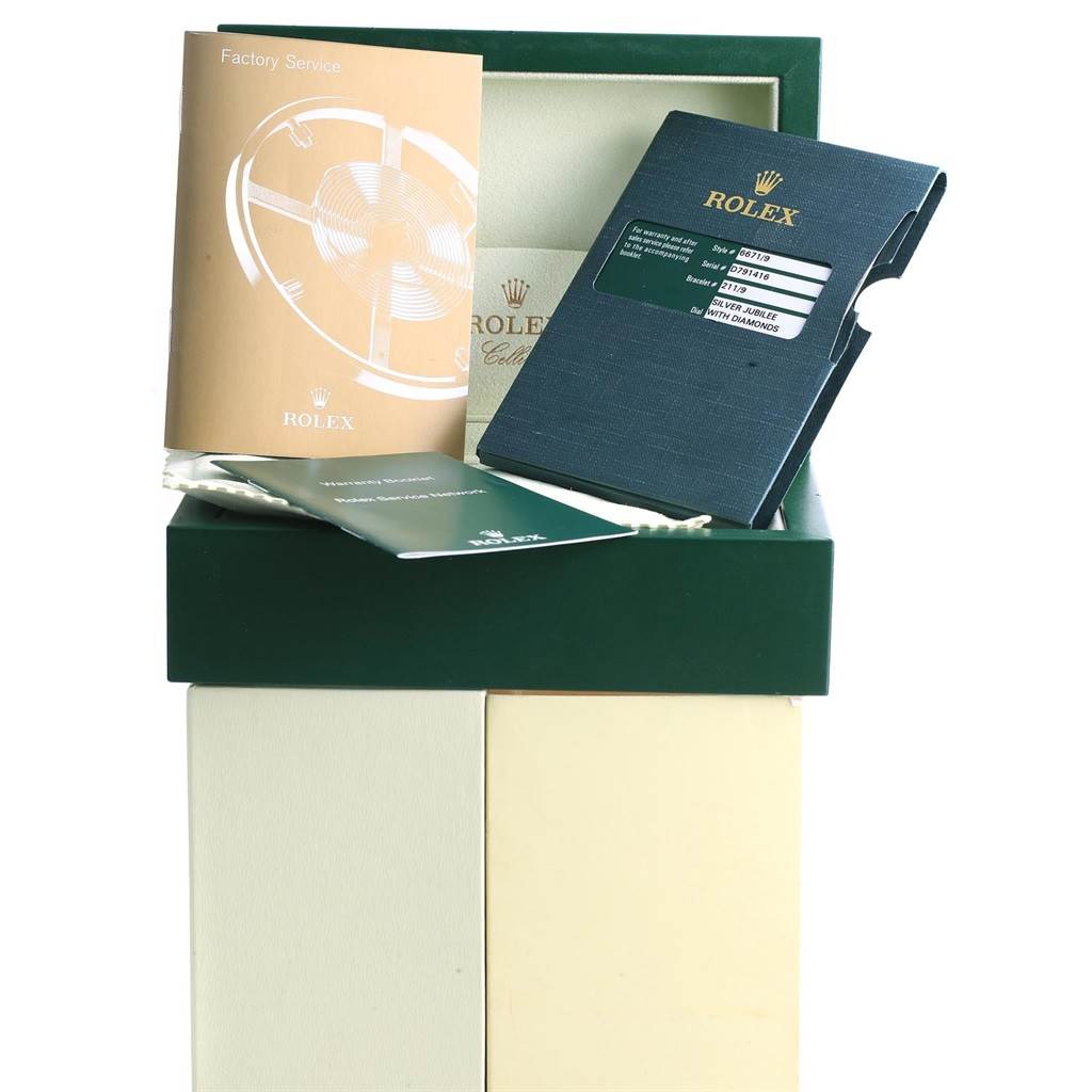 The image shows documentation and packaging for a Rolex Cellini 6671 Women's White Gold Silver Dial 6671 Women's White Gold Silver Dial model, including manuals and a green box.