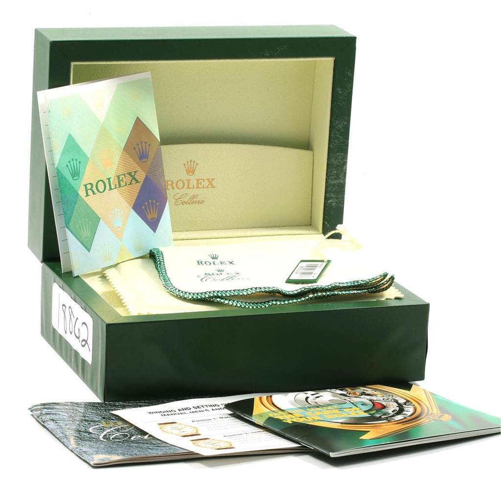The image shows a Rolex Cellini 6111 Women's Yellow Gold Champagne Dial 6111 Women's Yellow Gold Champagne Dial watch box with booklets, a cleaning cloth, and a tag displayed.