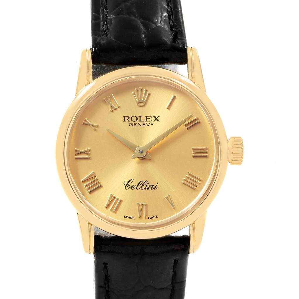 The Rolex Cellini 6111 Women's Yellow Gold Champagne Dial 6111 Women's Yellow Gold Champagne Dial watch is shown in a front-facing angle, displaying its dial, crown, and part of the strap.