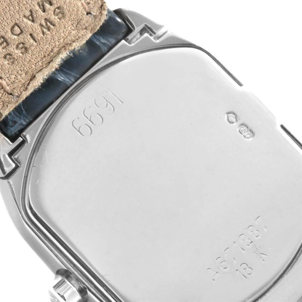 The image shows the back case and part of the strap of a Rolex Cellini 6691 Women's White Gold White Dial 6691 Women's White Gold White Dial watch up close.