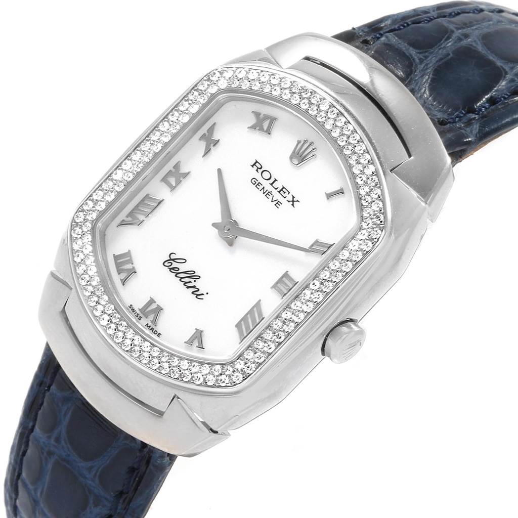 The image shows a close-up angle of the Rolex Cellini 6691 Women's White Gold White Dial 6691 Women's White Gold White Dial watch, highlighting the dial, bezel, and part of the blue leather strap.