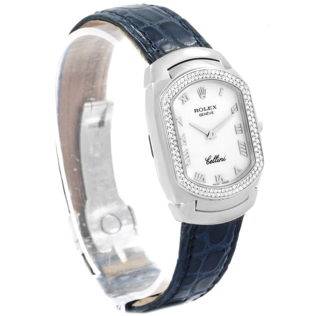 The image shows a Rolex Cellini 6691 Women's White Gold White Dial 6691 Women's White Gold White Dial watch from a frontal angle, featuring a white dial, diamond bezel, and a blue leather strap.