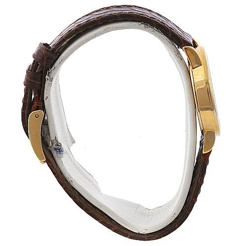 The image shows a side view of the Rolex Cellini 6110 Women's Yellow Gold Silver Dial 6110 Women's Yellow Gold Silver Dial watch, highlighting its gold case and brown leather strap.