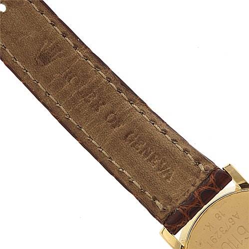 This image shows a close-up of the strap and part of the case back of a Rolex Cellini 6110 Women's Yellow Gold Silver Dial 6110 Women's Yellow Gold Silver Dial watch.