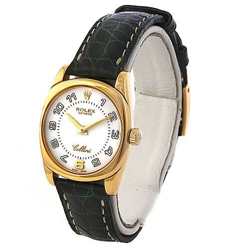 This image shows a Rolex Cellini 6229 Women's Yellow Gold White Dial 6229 Women's Yellow Gold White Dial watch at a slight angle, highlighting its gold bezel, white dial, black leather strap, and crown.