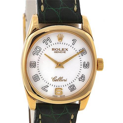 The Rolex Cellini 6229 Women's Yellow Gold White Dial 6229 Women's Yellow Gold White Dial watch is shown from a front angle, displaying its face, hour markers, hands, and leather strap.
