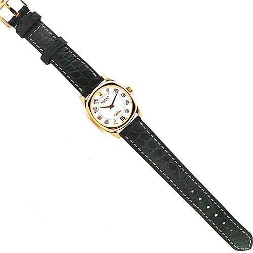 This image shows a Rolex Cellini 6229 Women's Yellow Gold White Dial 6229 Women's Yellow Gold White Dial watch with a top-down view highlighting its dial, case, crown, and leather strap.