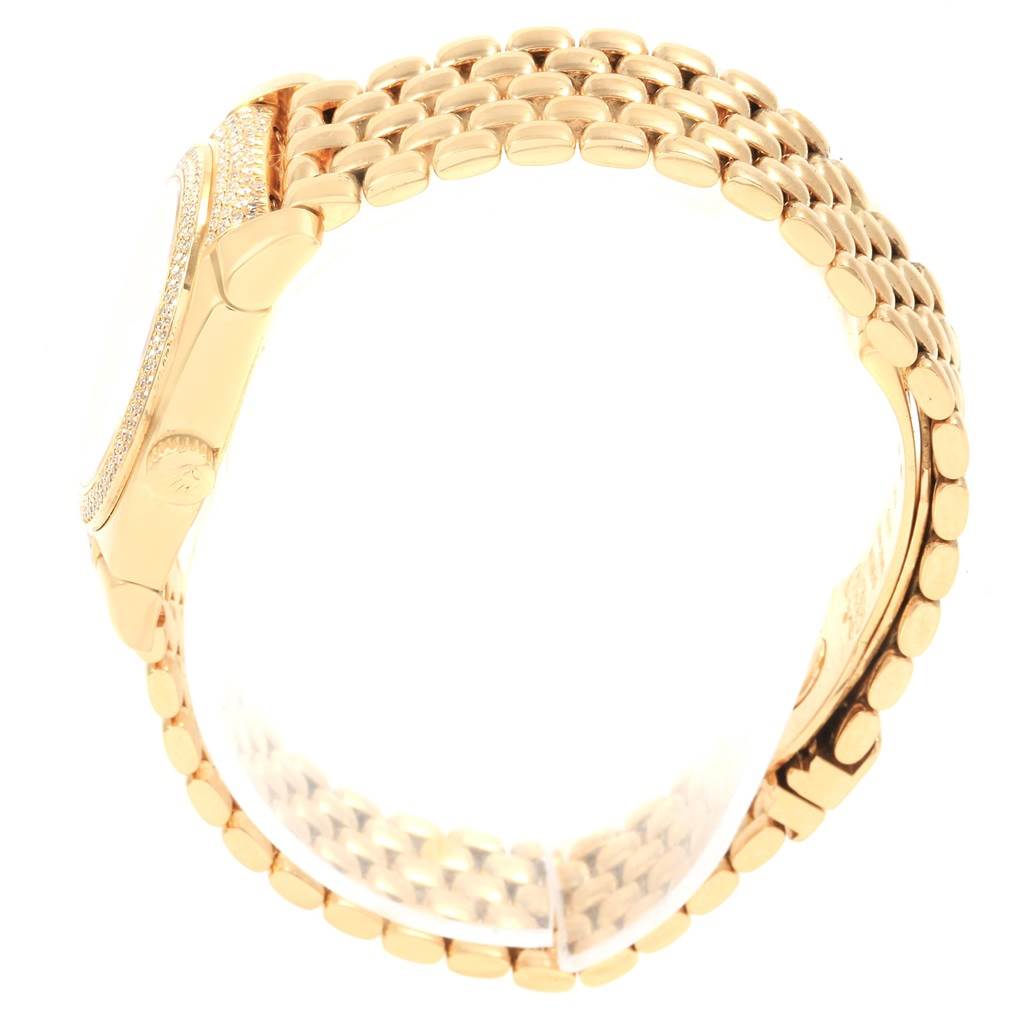 This image shows the side view of a gold Rolex Cellini 6311 Women's Yellow Gold Champagne Dial 6311 Women's Yellow Gold Champagne Dial watch, focusing on its case and bracelet.