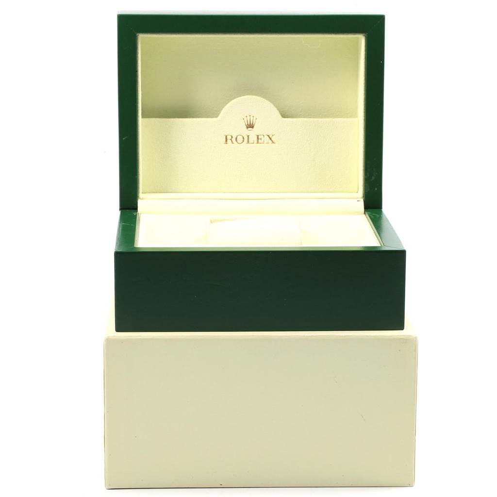 The image shows an open green and white Rolex Cellini 6311 Women's Yellow Gold Champagne Dial 6311 Women's Yellow Gold Champagne Dial watch box.