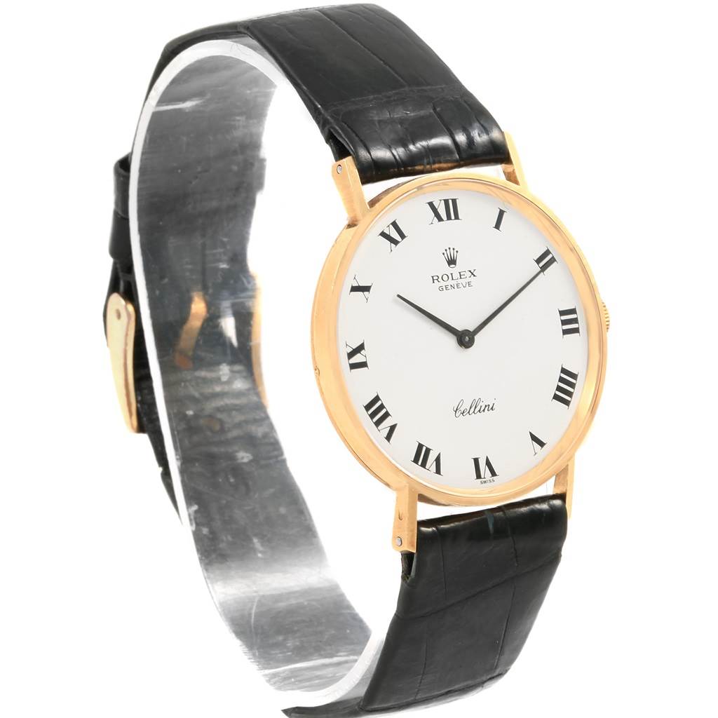 The image shows a Rolex Cellini 3833 Men's Yellow Gold White Dial 3833 Men's Yellow Gold White Dial watch at a slight angle, clearly displaying its face, strap, and clasp.