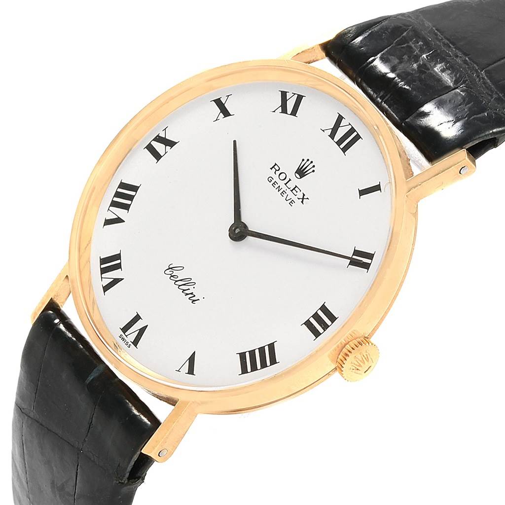 The image shows a close-up of a Rolex Cellini 3833 Men's Yellow Gold White Dial 3833 Men's Yellow Gold White Dial watch face, including the case, dial, hands, crown, and part of the black strap.