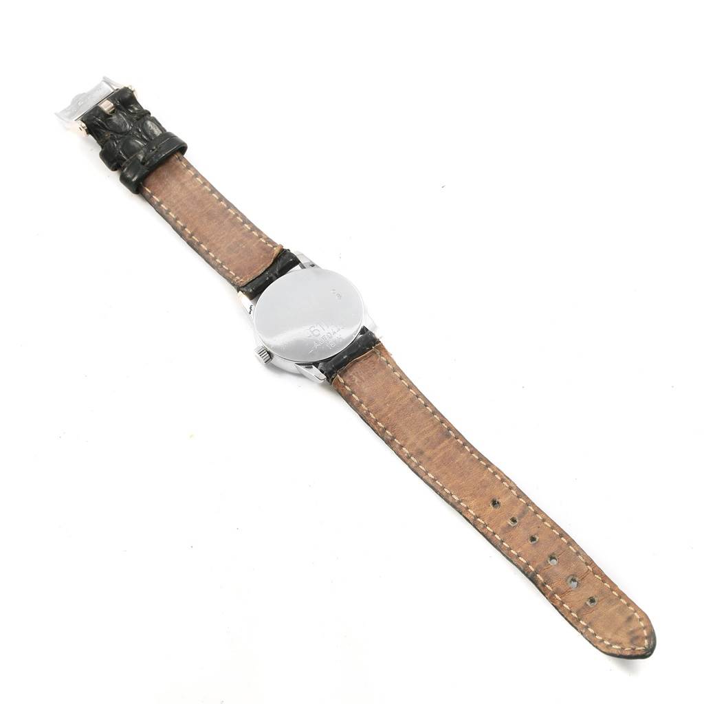 This image shows the backside and strap of a Rolex Cellini 6111 Women's White Gold Black Dial 6111 Women's White Gold Black Dial watch.