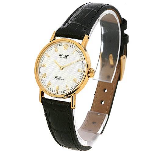 The Rolex Cellini 5109 Women's Yellow Gold Mother of Pearl Dial 5109 Women's Yellow Gold Mother of Pearl Dial watch is shown at a front three-quarter angle, highlighting its round gold case, white dial, and black leather strap.