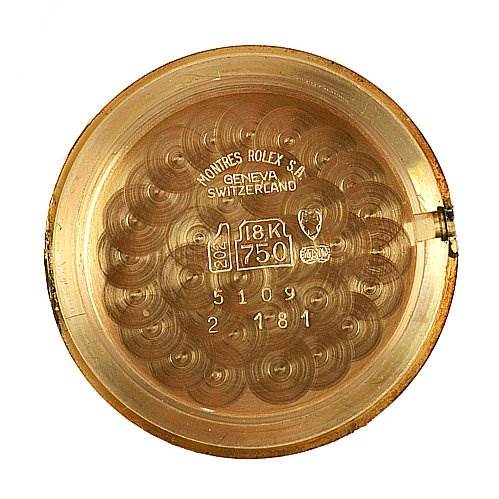 This image shows the interior case back of a Rolex Cellini 5109 Women's Yellow Gold Mother of Pearl Dial 5109 Women's Yellow Gold Mother of Pearl Dial watch, marked with hallmarks and specifications.