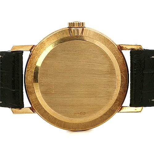 The image shows the back case of a Rolex Cellini 5109 Women's Yellow Gold Mother of Pearl Dial 5109 Women's Yellow Gold Mother of Pearl Dial watch in gold with a black leather strap, viewed from the rear.