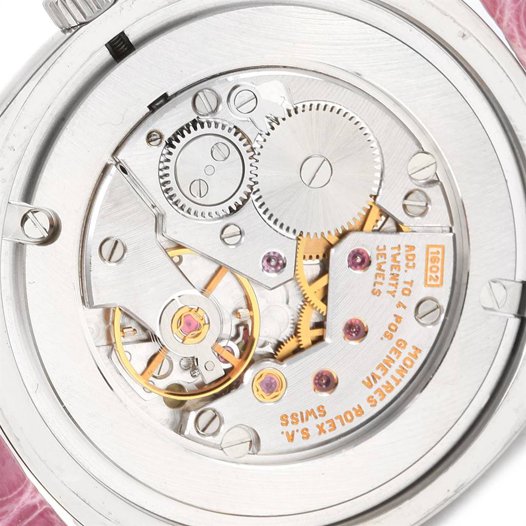 This image shows the inner mechanics of the Cellini model by Rolex, focusing on the movement and gears.