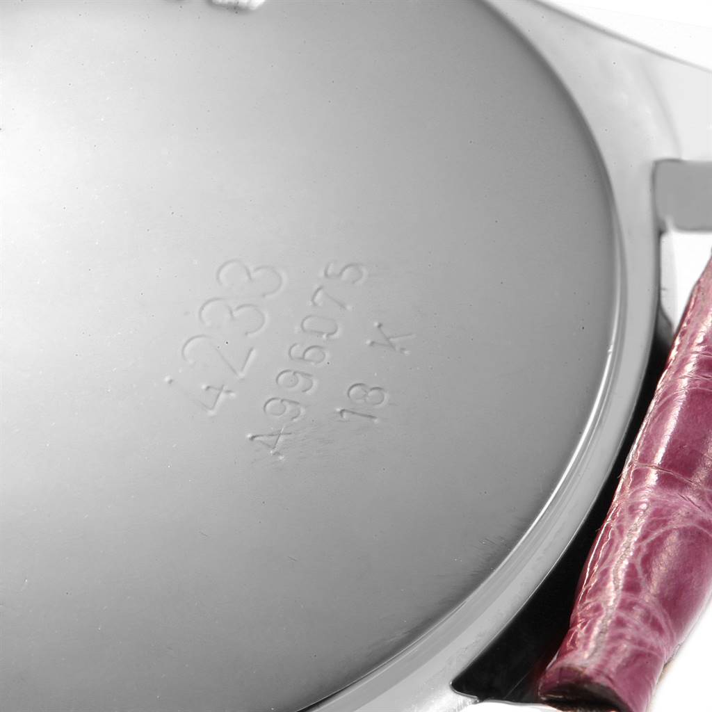 The image shows the back case of a Rolex Cellini 4233 Women's White Gold Black Dial 4233 Women's White Gold Black Dial watch with visible engravings and a partial leather strap.