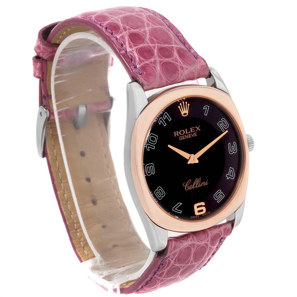 The Rolex Cellini 4233 Women's White Gold Black Dial 4233 Women's White Gold Black Dial watch is shown at a three-quarter angle, featuring its pink leather strap, rose gold bezel, black dial, and silver-tone case.