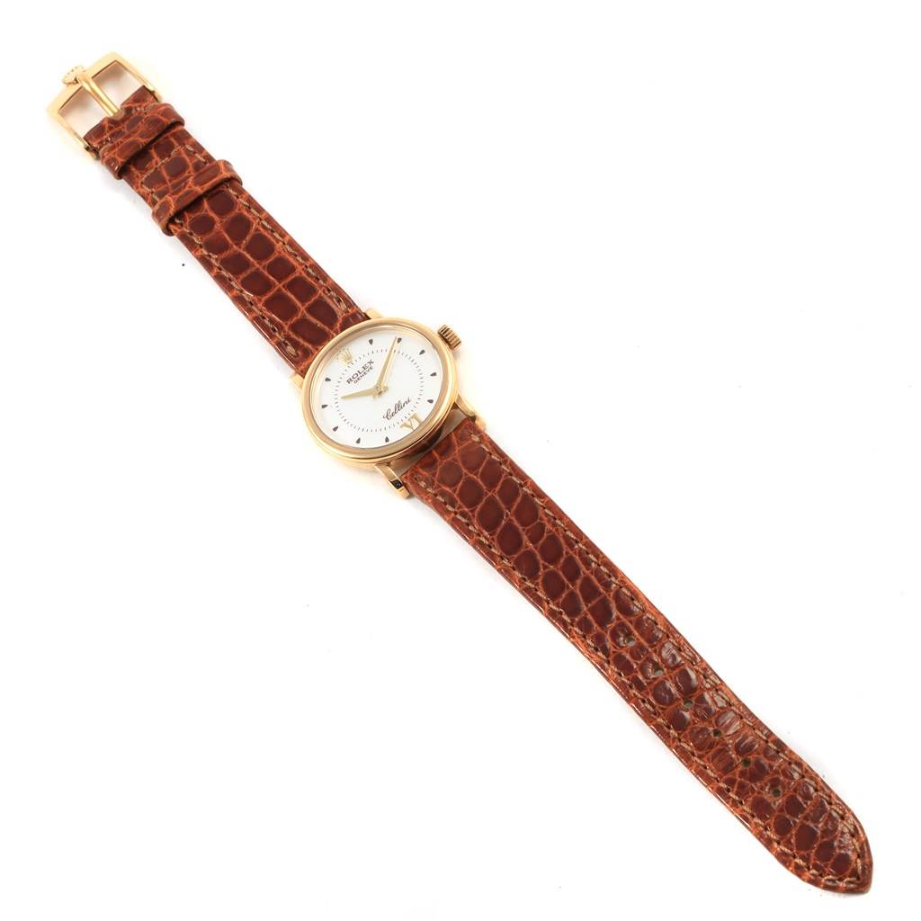 The image shows a Rolex Cellini 6110 Women's Yellow Gold Silver Dial 6110 Women's Yellow Gold Silver Dial watch with a brown leather strap, viewed from above.