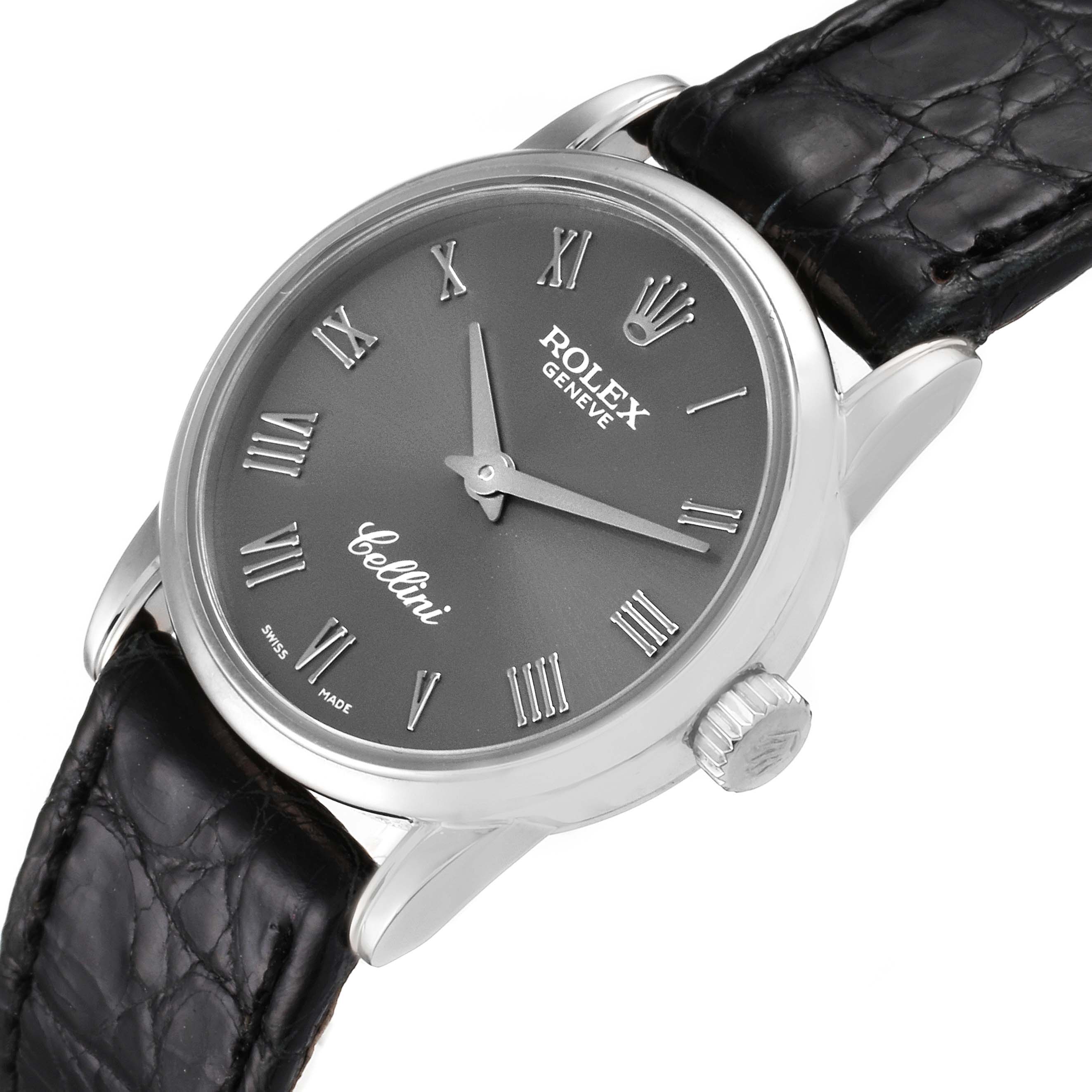 This image shows the front and right side of a Rolex Cellini 6111 Women's White Gold Grey Dial 6111 Women's White Gold Grey Dial watch, including the dial, crown, and leather strap.