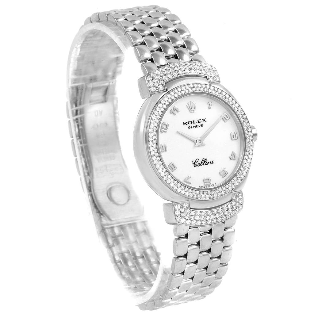 The Rolex Cellini 6673 Women's White Gold White Dial 6673 Women's White Gold White Dial watch is shown at a slight angle, displaying its face, bezel, and metal bracelet prominently.