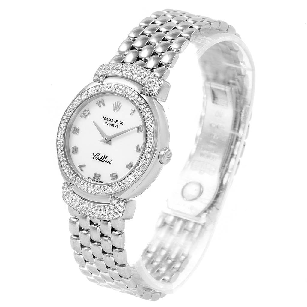 The image shows a Rolex Cellini 6673 Women's White Gold White Dial 6673 Women's White Gold White Dial watch from an angled front view, highlighting the dial, bezel, diamonds, and bracelet.