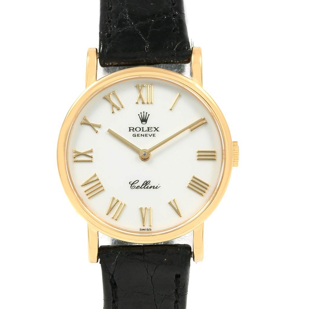 The image shows a front view of a Rolex Cellini 5109 Women's Yellow Gold White Dial 5109 Women's Yellow Gold White Dial watch with a white dial, gold Roman numerals, and a black leather strap.
