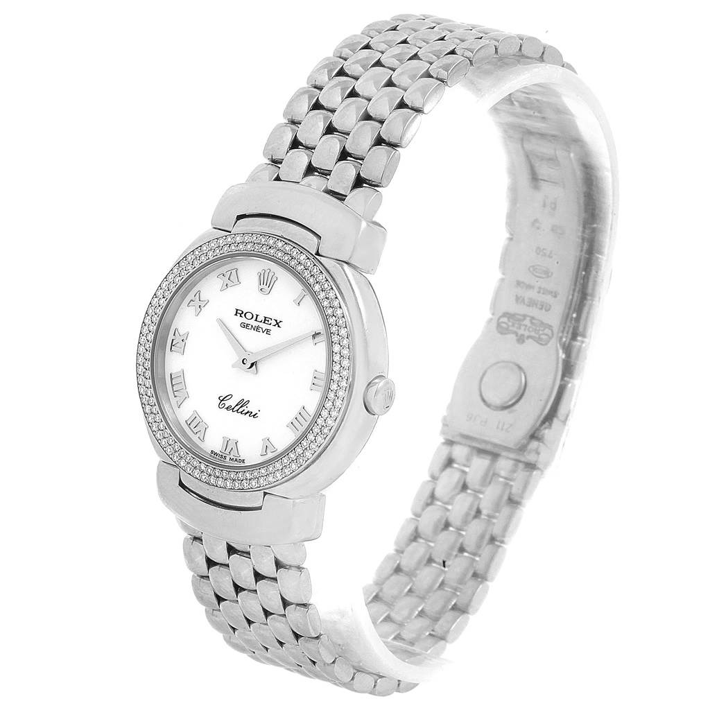 The Rolex Cellini 6671 Women's White Gold White Dial 6671 Women's White Gold White Dial watch is shown at a slight angle, showcasing its face, bezel, bracelet, and part of the clasp.