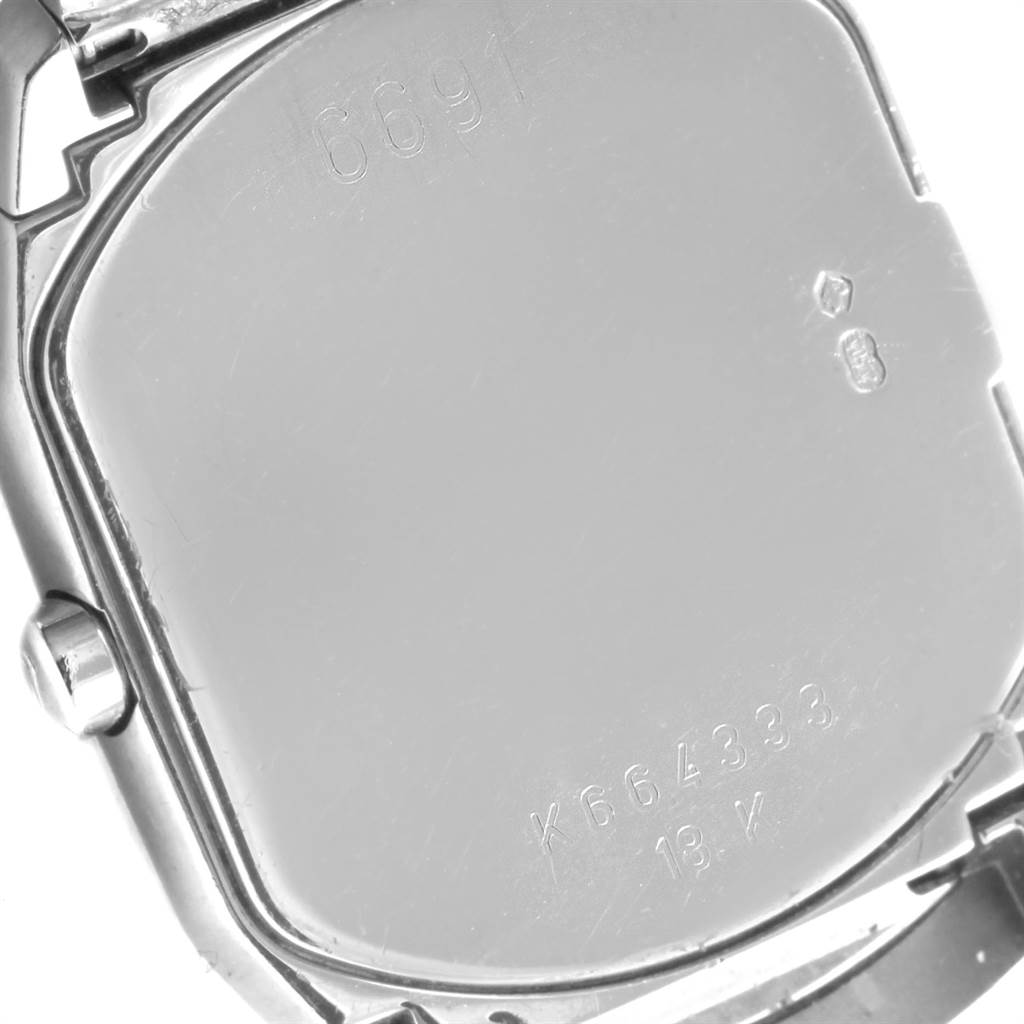 This image shows the back case of a Rolex Cellini 6691 Women's White Gold White Dial 6691 Women's White Gold White Dial model watch from a close-up, angled view.