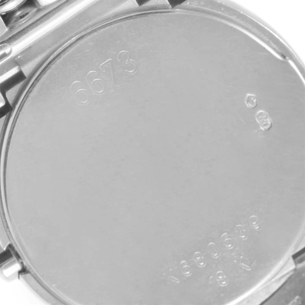 The image displays the case back of a Rolex Cellini 6673 Women's White Gold Silver Dial 6673 Women's White Gold Silver Dial watch, focusing on its engraved model and serial numbers.